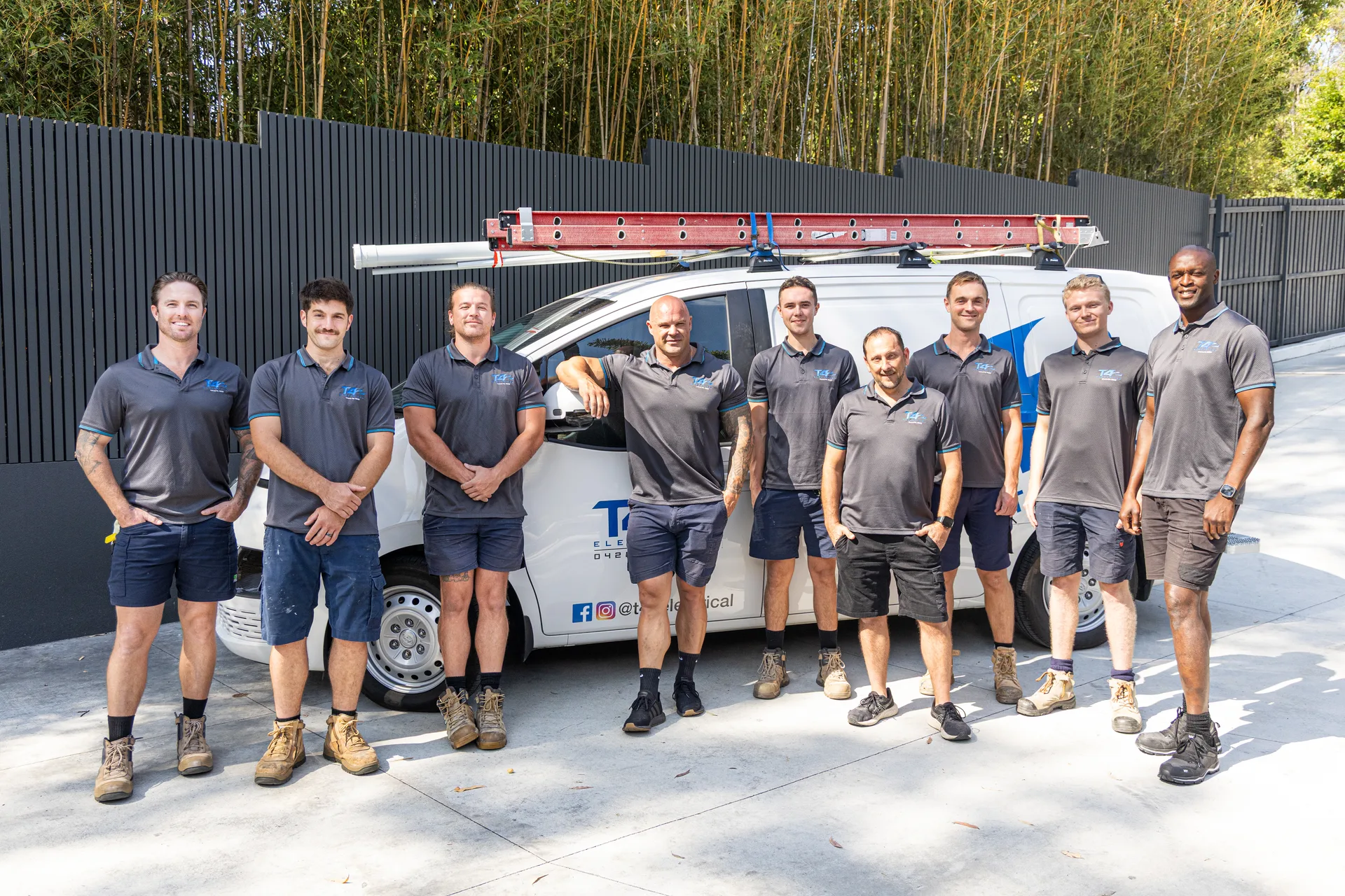The Family Electrician Mudgeeraba team with a service van